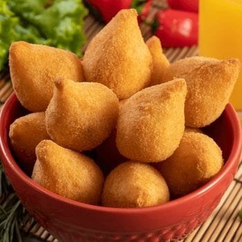 Platter of vegetarian fried mozzarella cheese balls with a crispy crust.