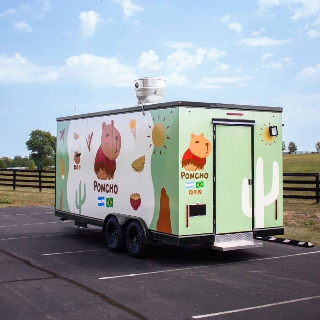 Poncho food truck trailer parked in an outdoor space.